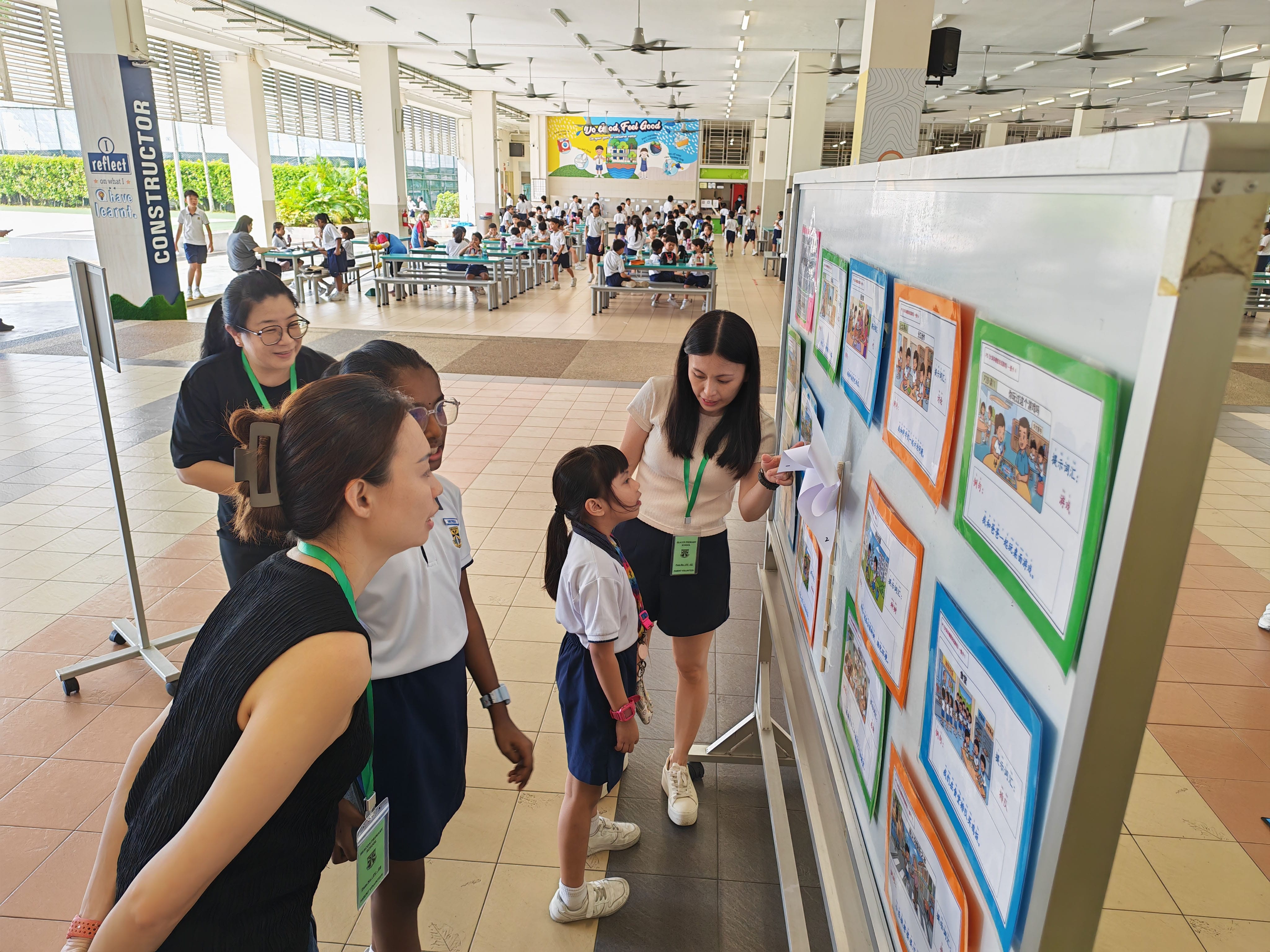 With the support of parent volunteers, students enthusiastically attempted the language challenges.